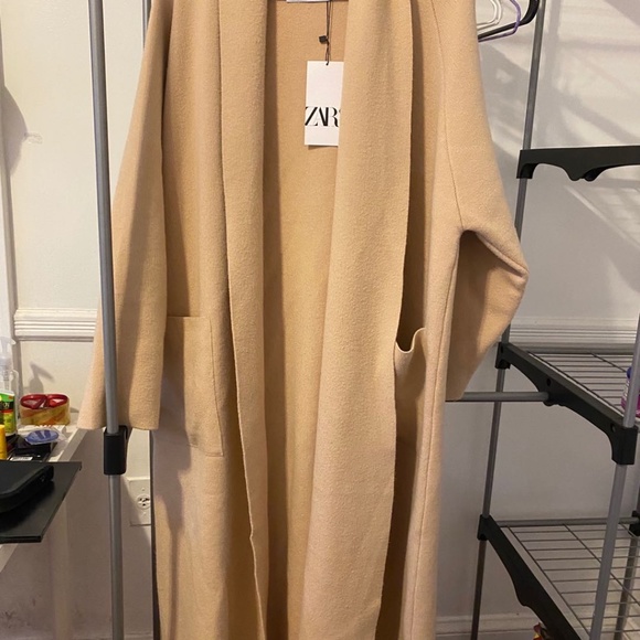 mountain warehouse featherweight down gilet